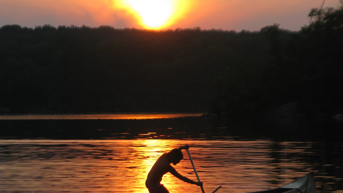 Fall sunset canoe